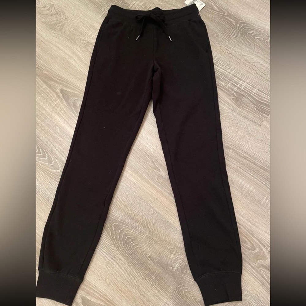 Roots Women’s Drawstring Waist Black Jogging Pants size XS 
BRAND NEW WITH TAGS